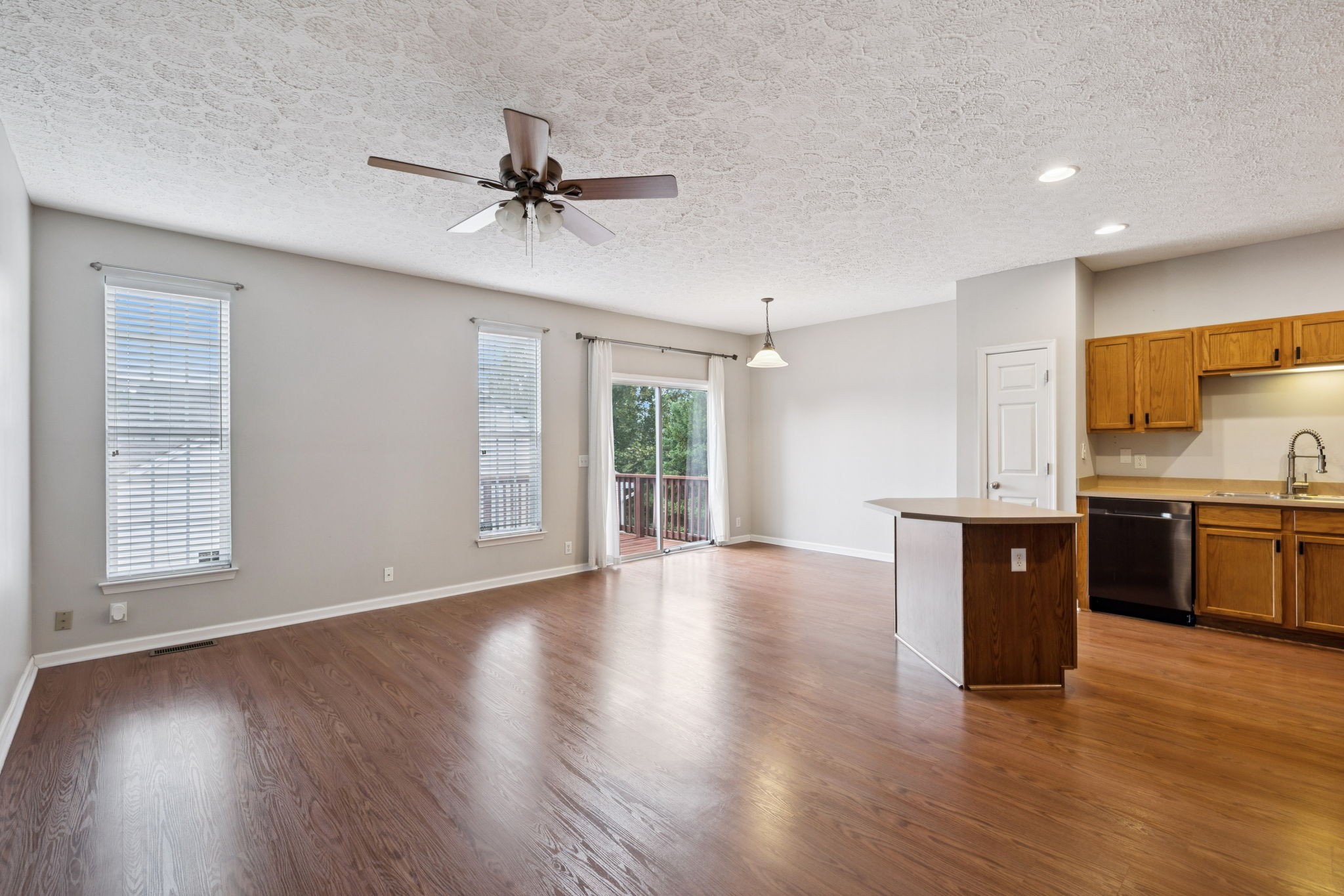 1345 Bell Road, Unit 412 Antioch, TN 37013 - Photo 7 of 34 a view of an empty room with window and wooden floor