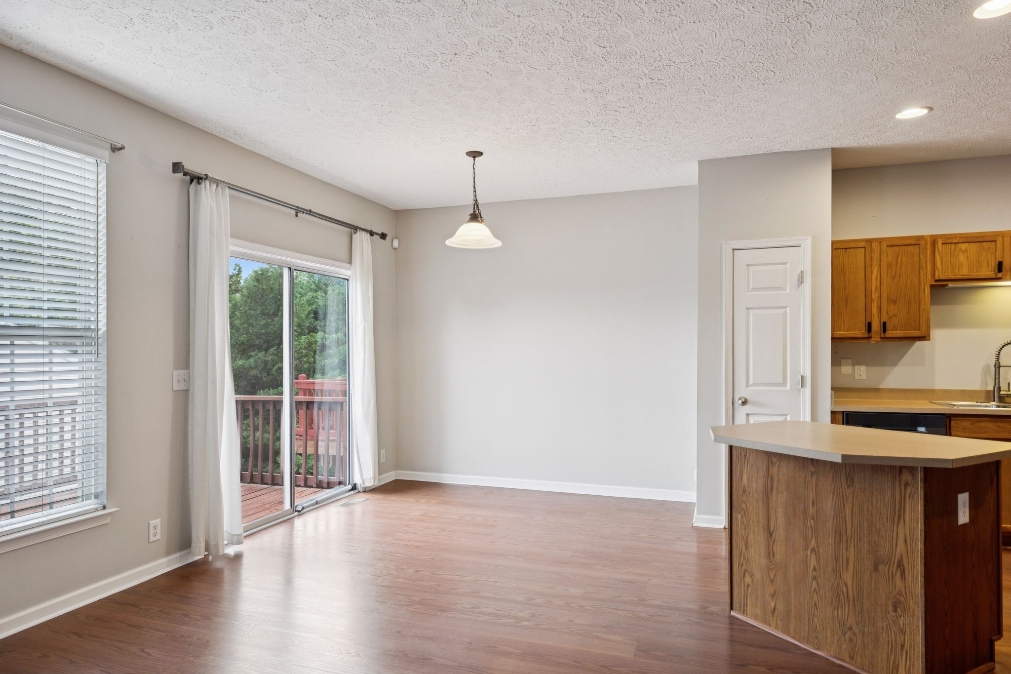 1345 Bell Road, Unit 412 Antioch, TN 37013 - Photo 9 of 34 a view of a kitchen with wooden floor and a window