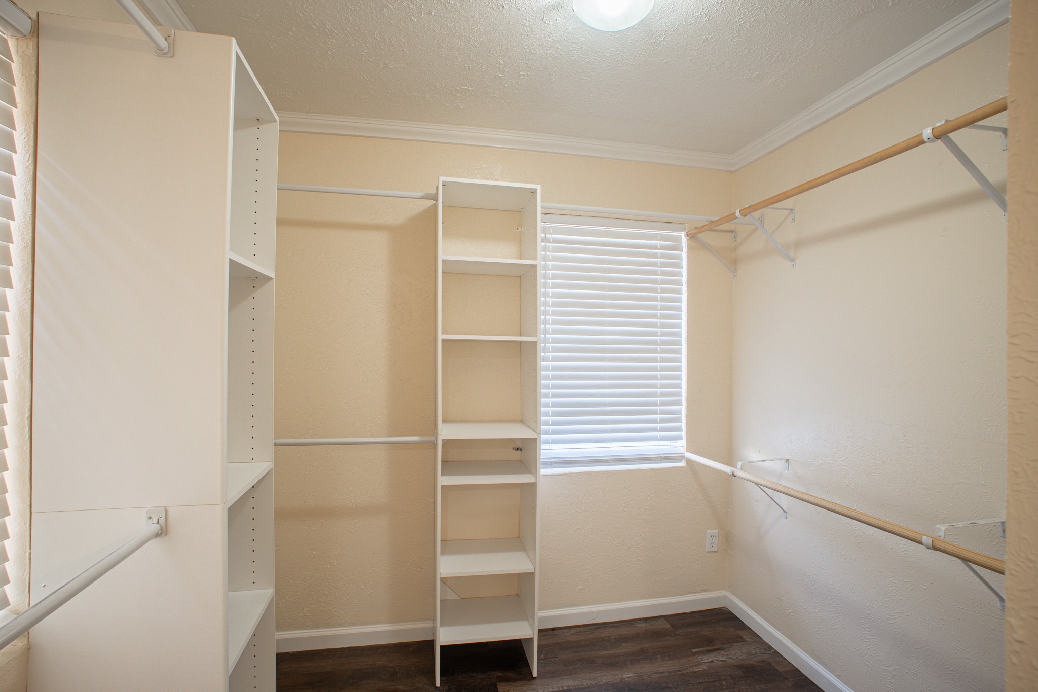 214 North Calhoun Street Groesbeck, TX 76642 - Photo 15 of 20 a view of walk in closet with empty racks