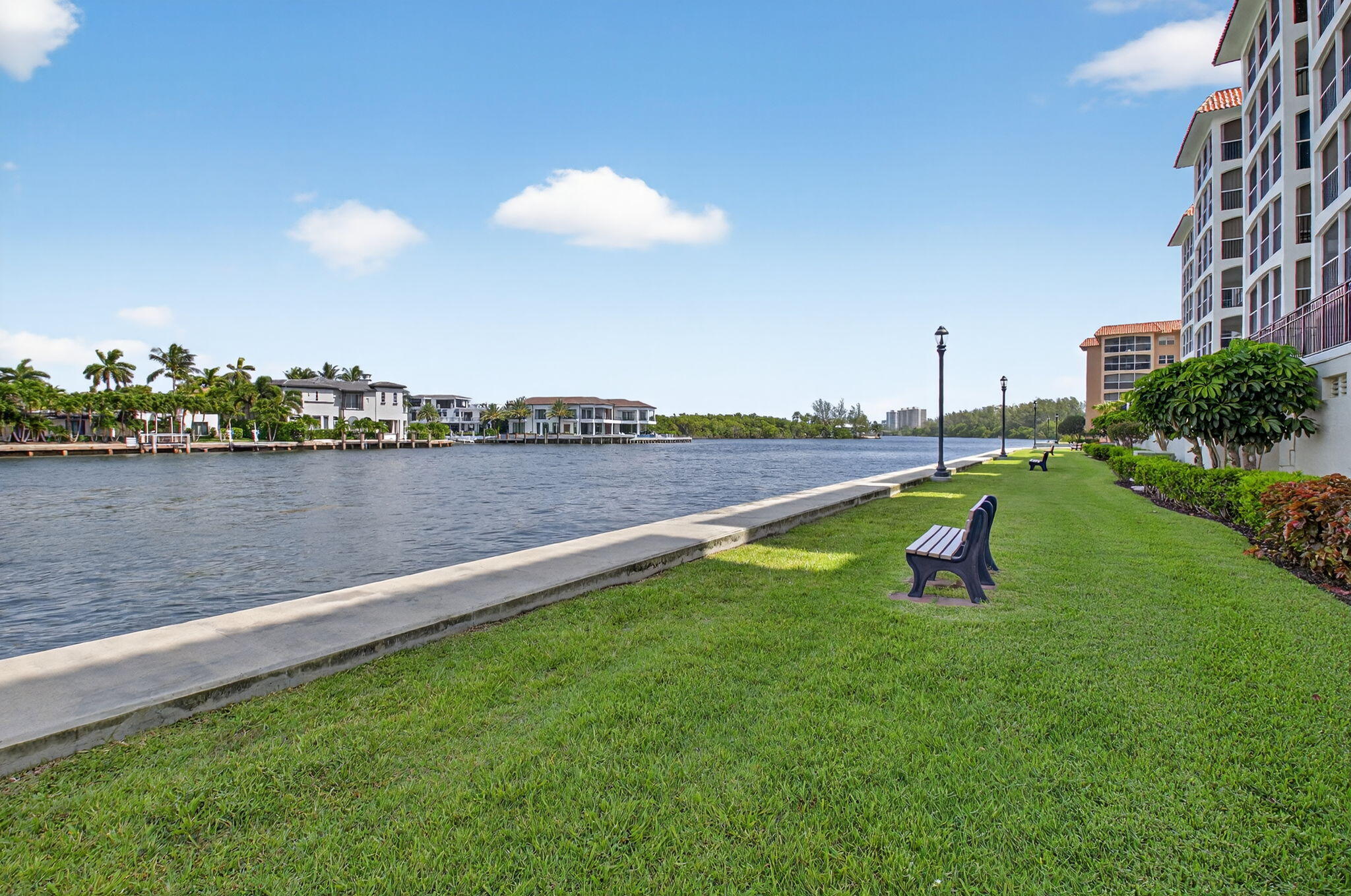 2871 North Ocean Boulevard, Unit R254 Boca Raton, FL 33431 - Photo 36 of 67 a view of a lake with a yard and a large pool
