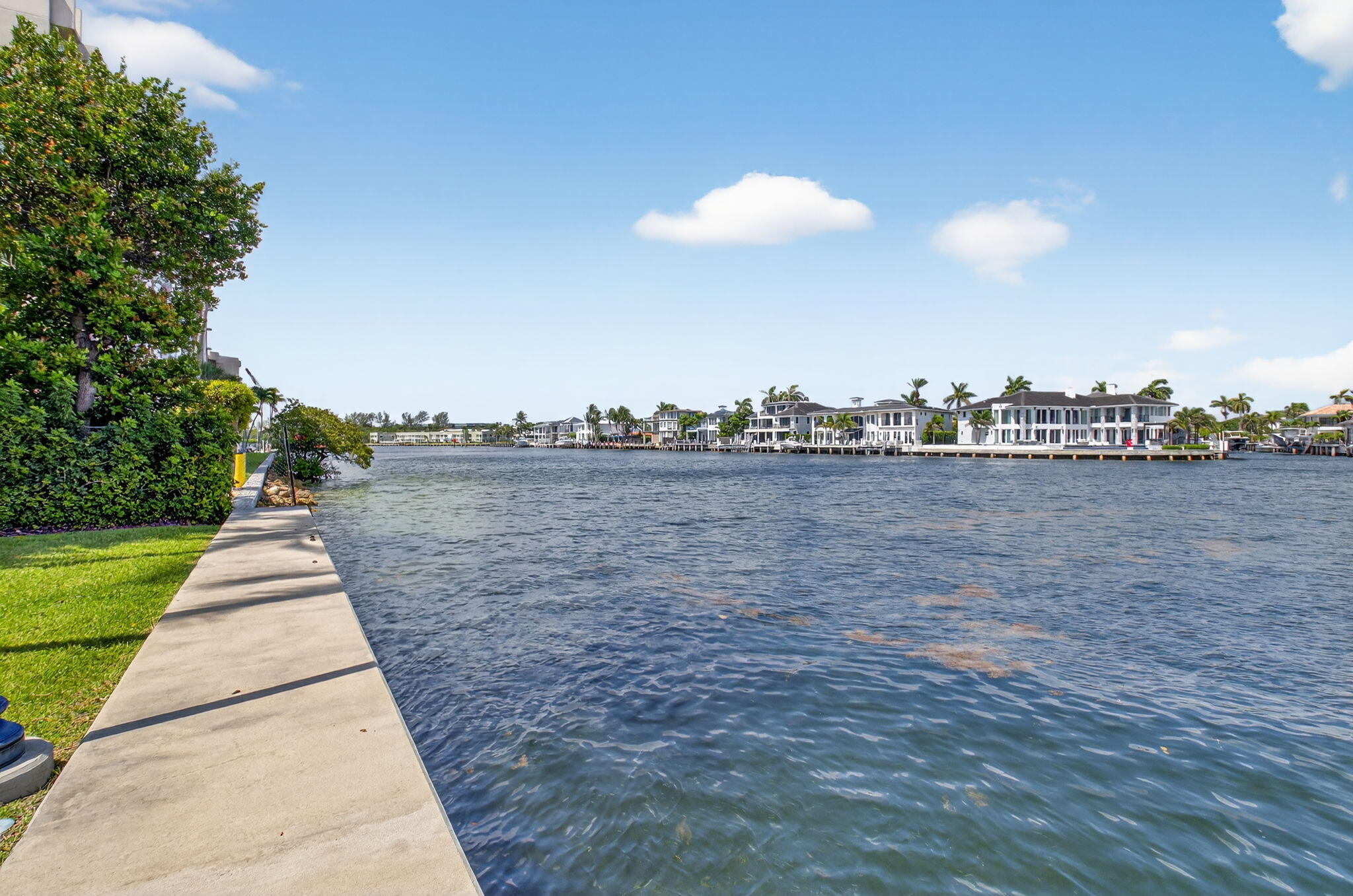 2871 North Ocean Boulevard, Unit R254 Boca Raton, FL 33431 - Photo 41 of 67 a front view of a house with a yard