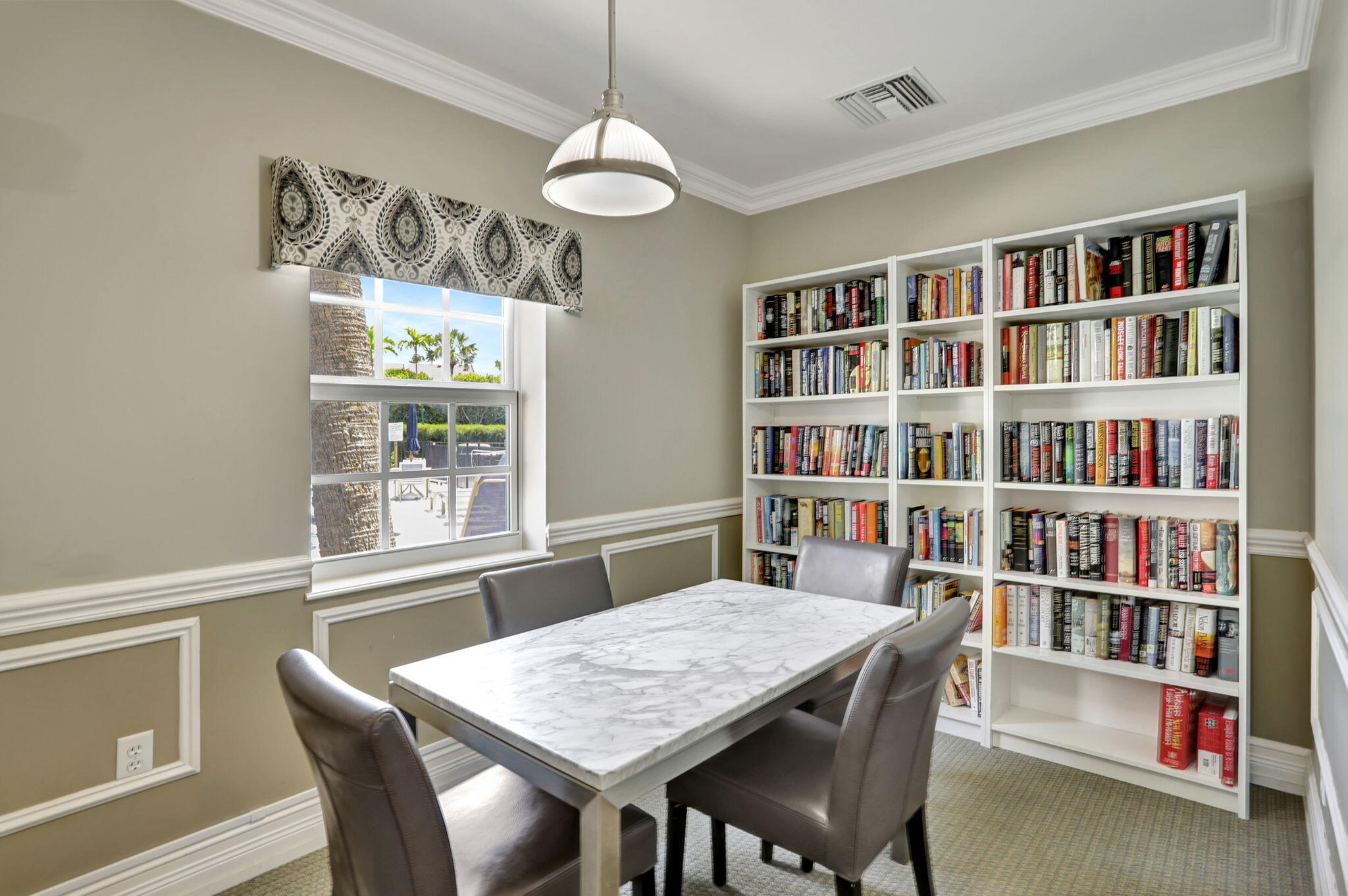 2871 North Ocean Boulevard, Unit R254 Boca Raton, FL 33431 - Photo 48 of 67 a view of a dining room with furniture window and wooden floor