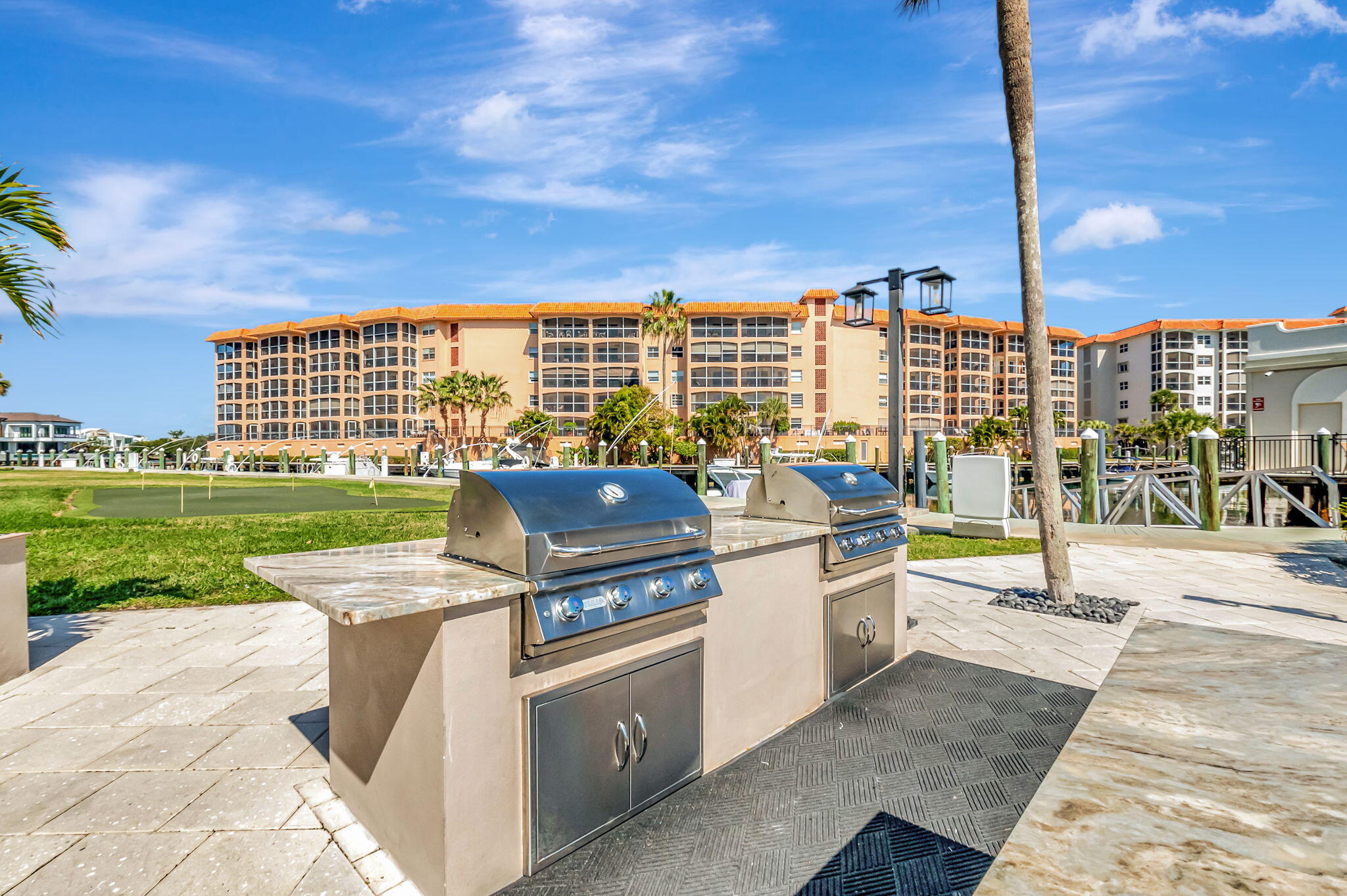 2871 North Ocean Boulevard, Unit R254 Boca Raton, FL 33431 - Photo 59 of 67 a view of a terrace with lawn chairs