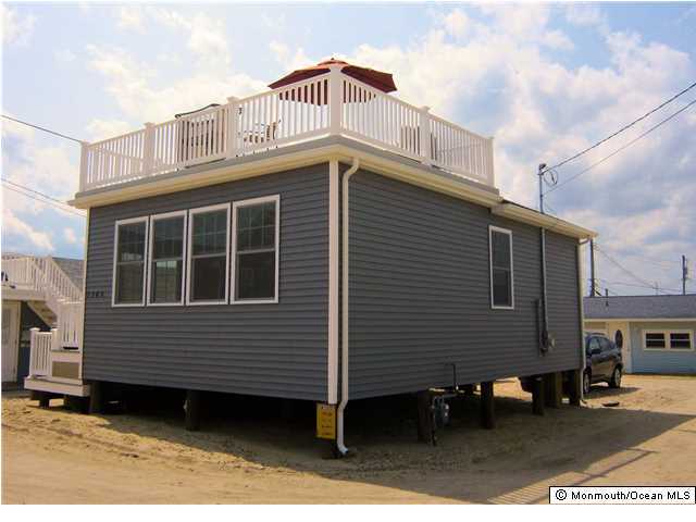 3305 Seaview Road Lavallette, NJ 08735 - Photo 2 of 13 a front view of a house