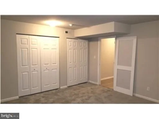 a bathroom with a sink and a shower