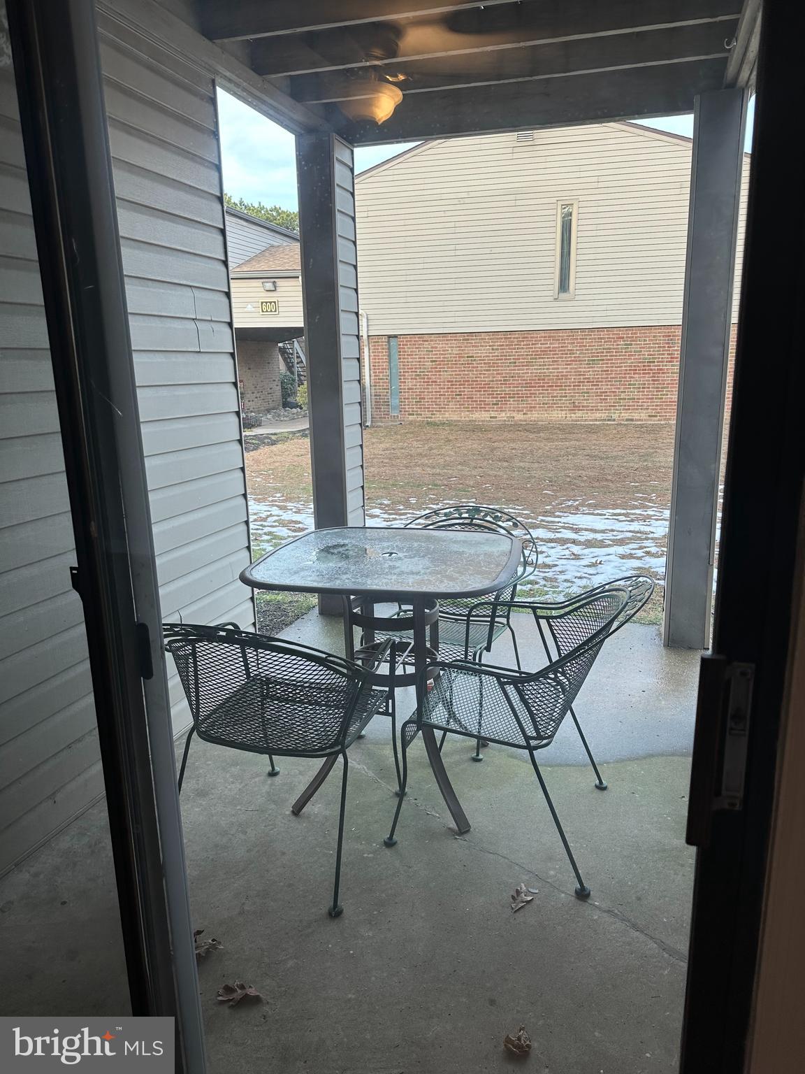 1801 Egg Harbor Road, Unit 105 Clementon, NJ 08021 - Photo 14 of 14 a view of a room with a table and chairs
