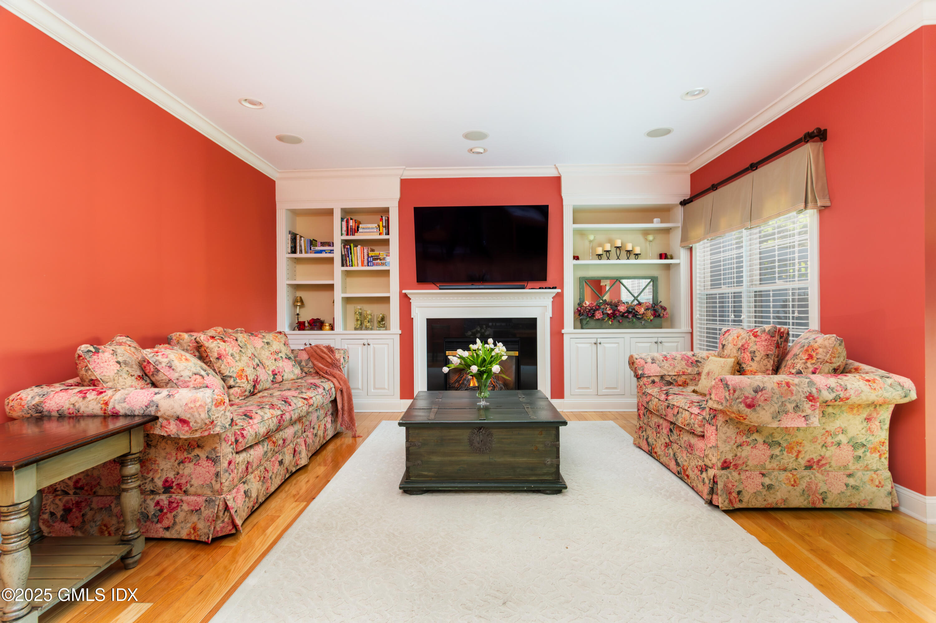 105 Hamilton Avenue, Unit 9 Greenwich, CT 06830 - Photo 6 of 20 a living room with furniture fireplace and flat screen tv