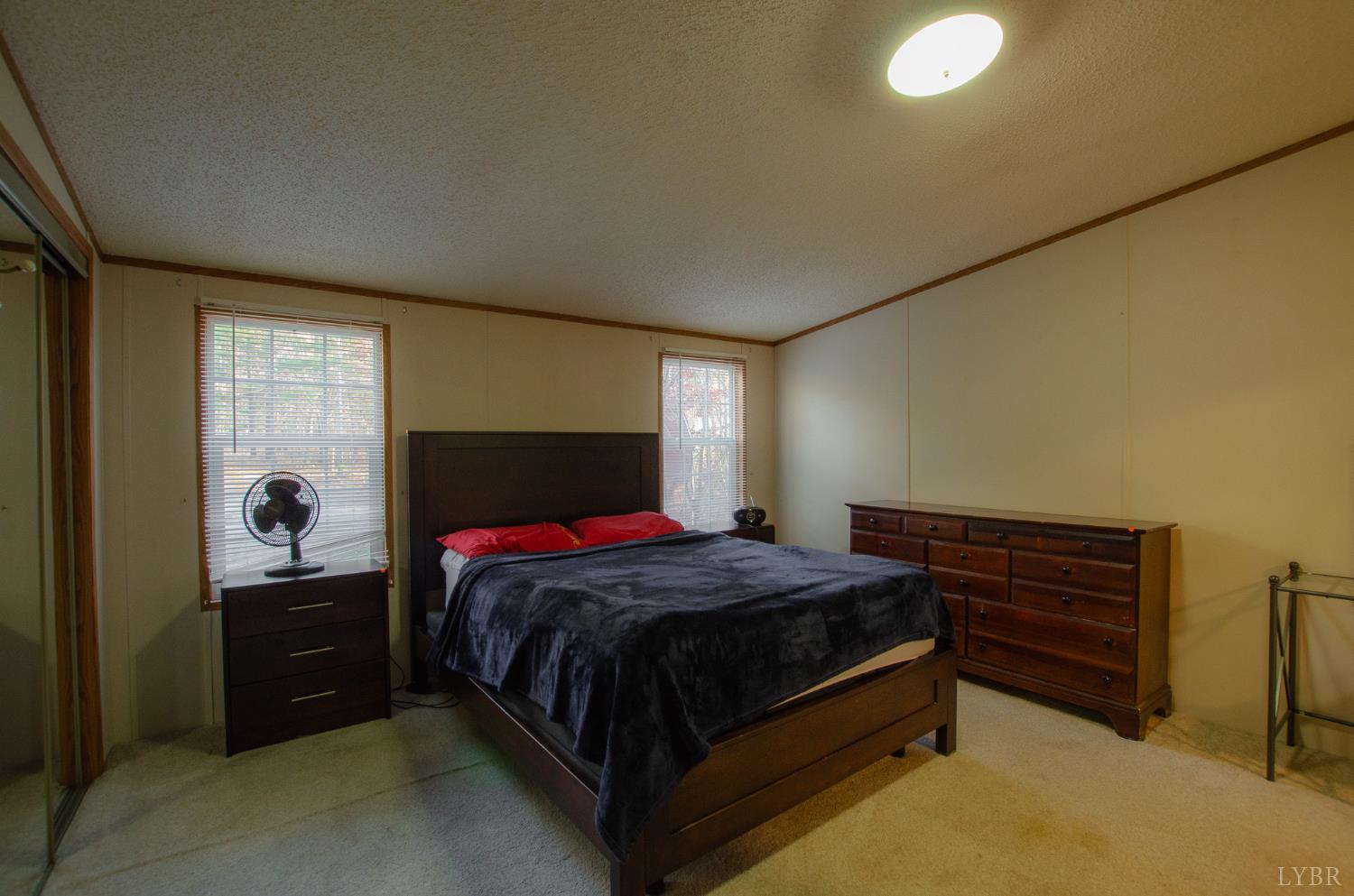 1708 Mud Street Concord, VA 24538 - Photo 13 of 44 a bedroom with a bed and a window