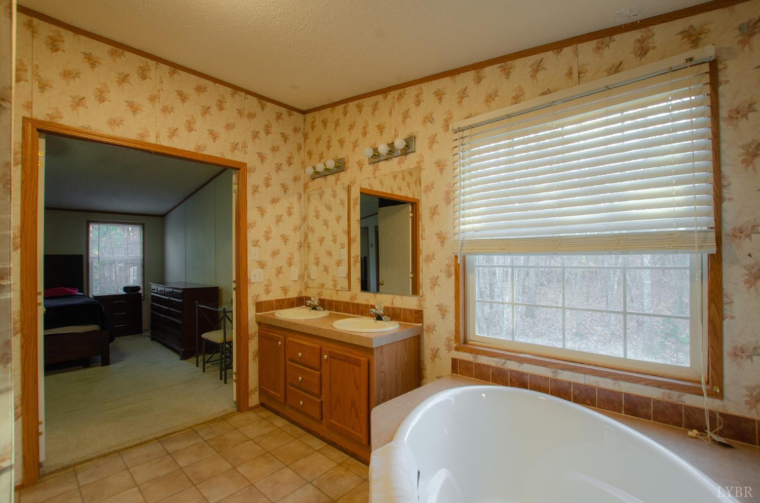 1708 Mud Street Concord, VA 24538 - Photo 17 of 44 a living room with furniture and a window