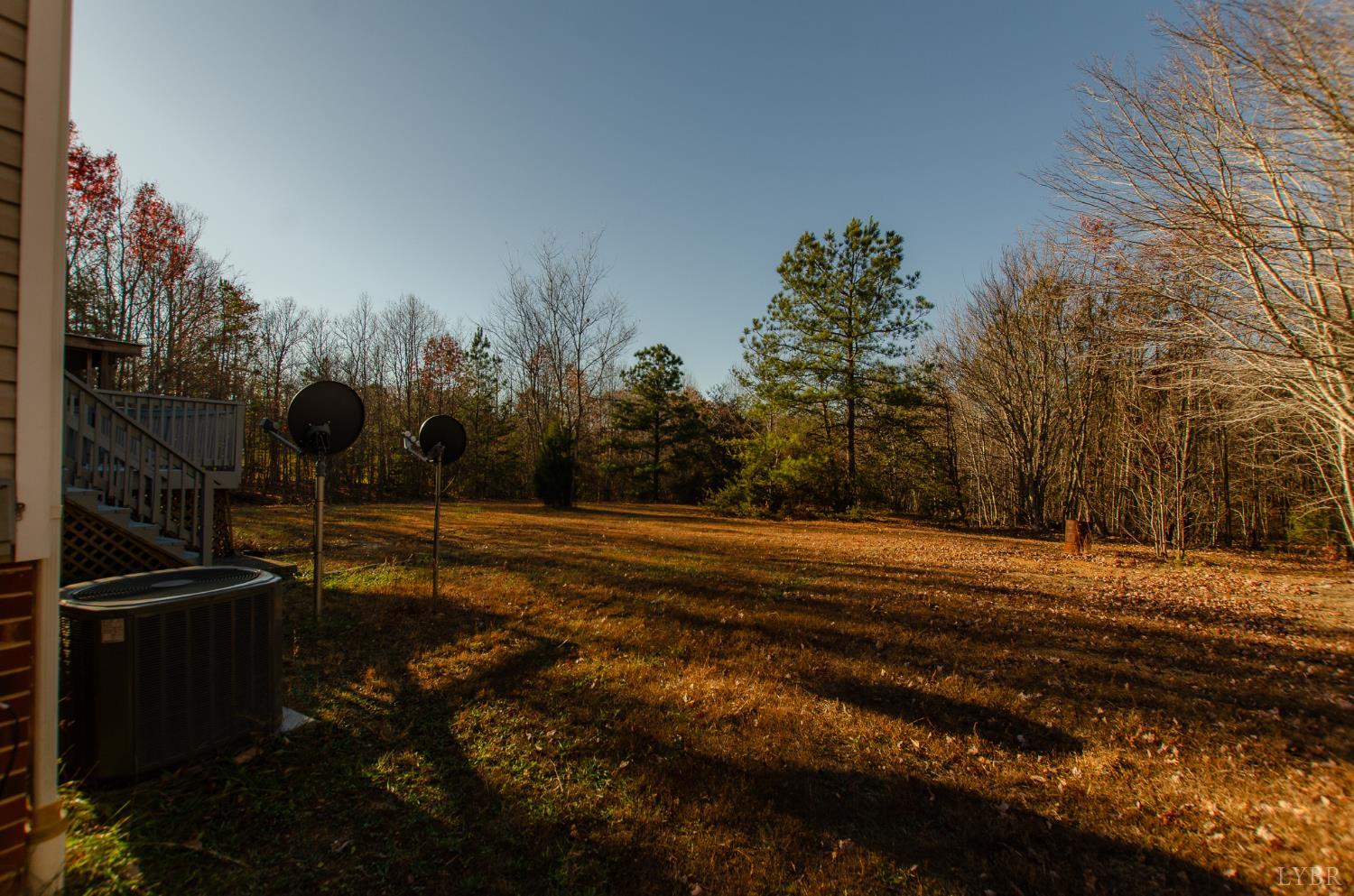 1708 Mud Street Concord, VA 24538 - Photo 2 of 44 a view of a backyard of the house