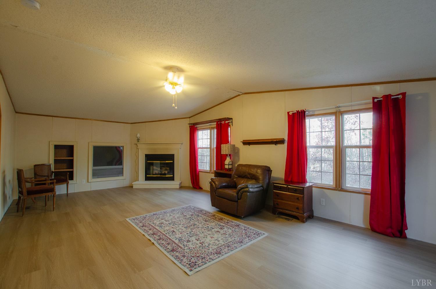 1708 Mud Street Concord, VA 24538 - Photo 22 of 44 a living room with furniture rug and a window