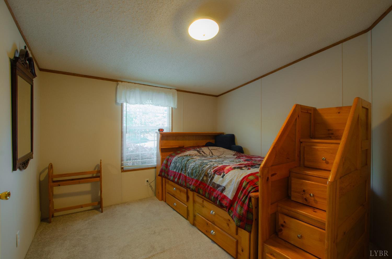 1708 Mud Street Concord, VA 24538 - Photo 24 of 44 a bedroom with a bed and a closet