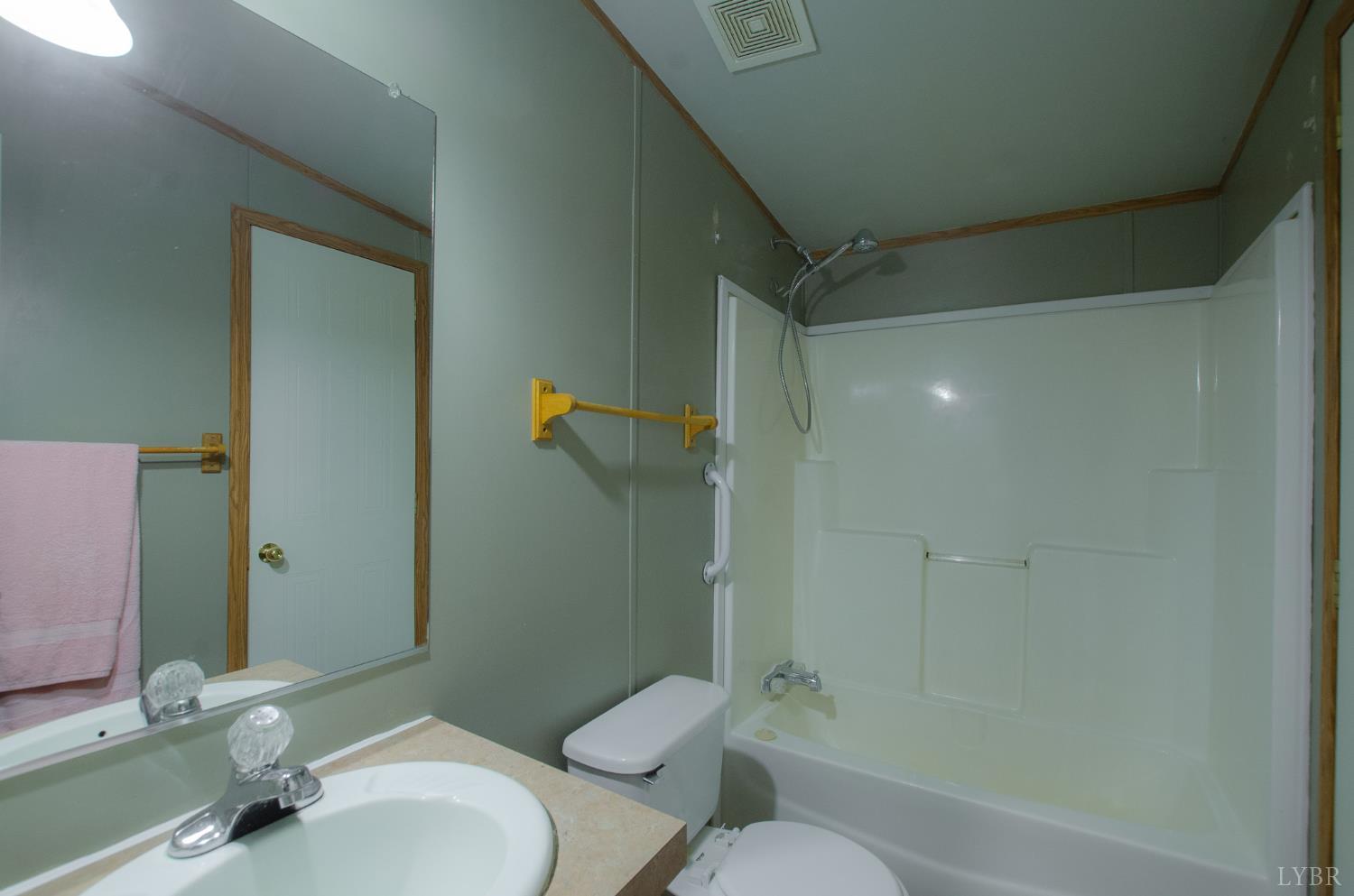 1708 Mud Street Concord, VA 24538 - Photo 26 of 44 a bathroom with a granite countertop sink toilet and shower