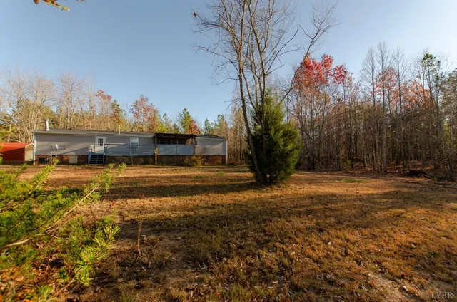 a view of a town with large trees