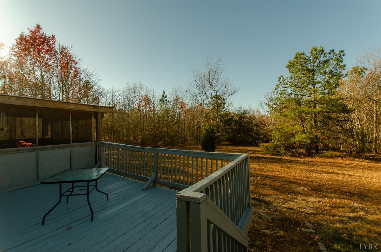 1708 Mud Street Concord, VA 24538 - Photo 32 of 44 a balcony with wooden floor and bench