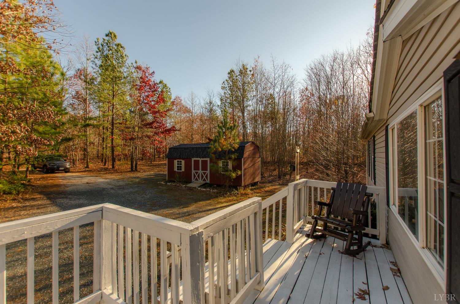 1708 Mud Street Concord, VA 24538 - Photo 4 of 44 a view of a house with backyard and trees