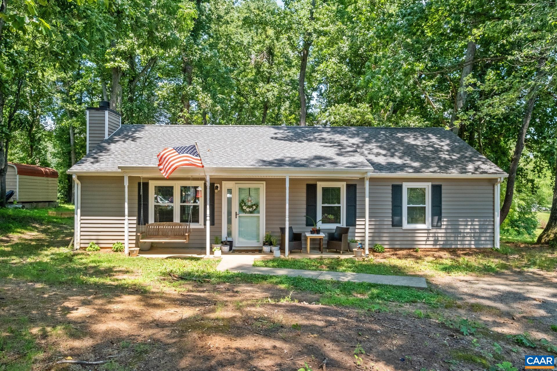71 Azalea Road Ruckersville, VA 22968 - Photo 1 of 23 front view of a house with a yard