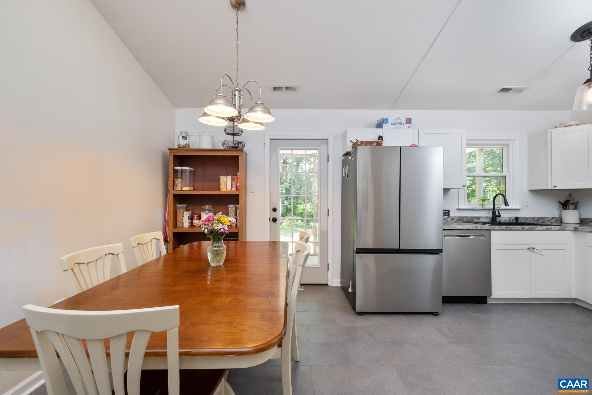 71 Azalea Road Ruckersville, VA 22968 - Photo 12 of 23 a dining room with furniture a chandelier and window