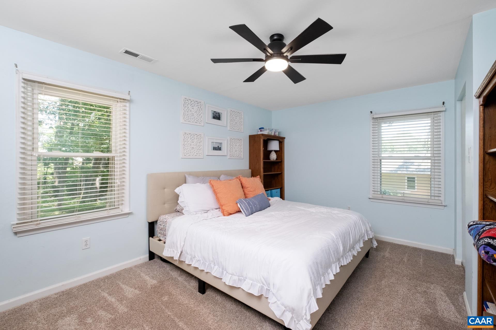 71 Azalea Road Ruckersville, VA 22968 - Photo 14 of 23 a bedroom with a large bed and a window