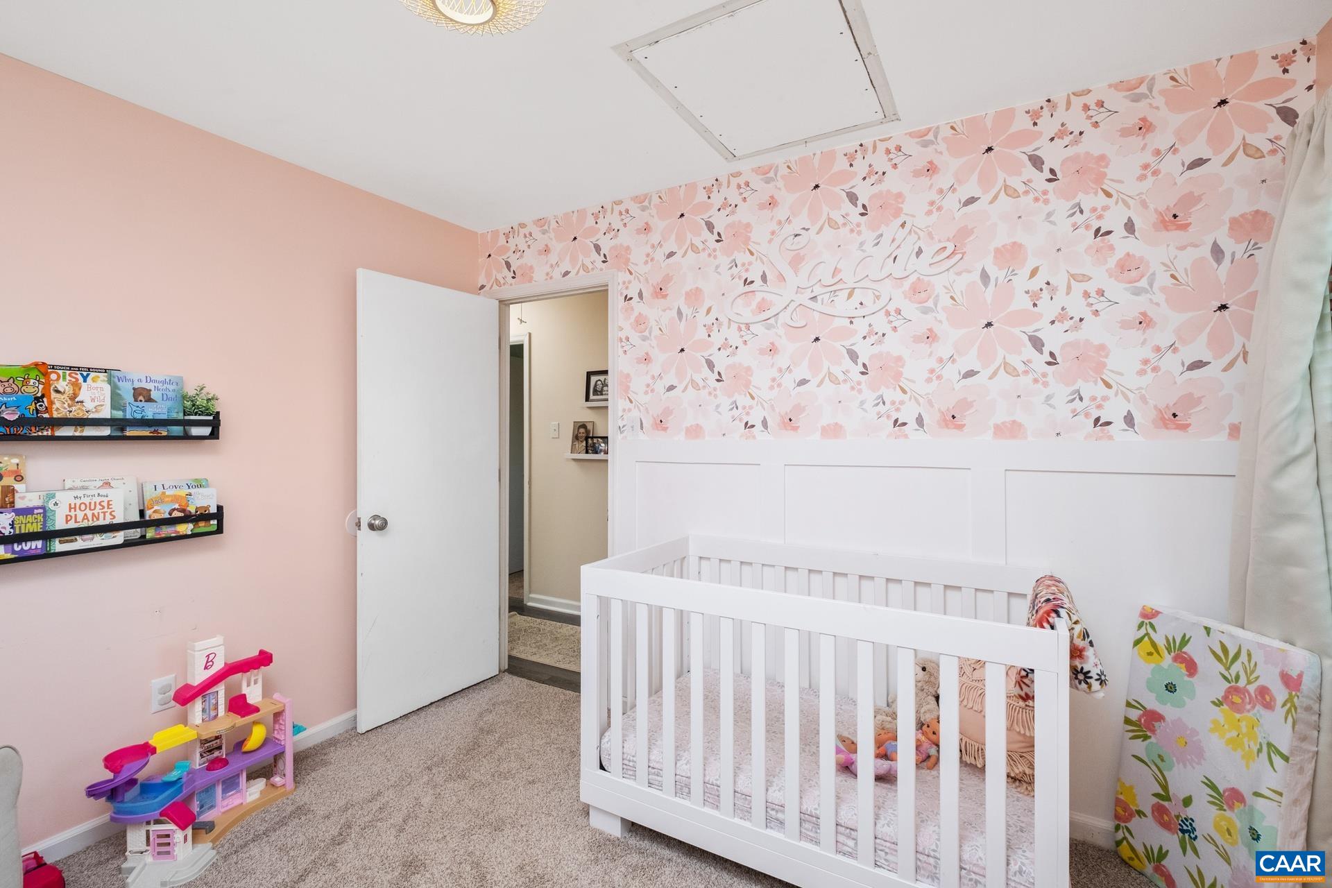 71 Azalea Road Ruckersville, VA 22968 - Photo 16 of 23 a bedroom with furniture and baby bed