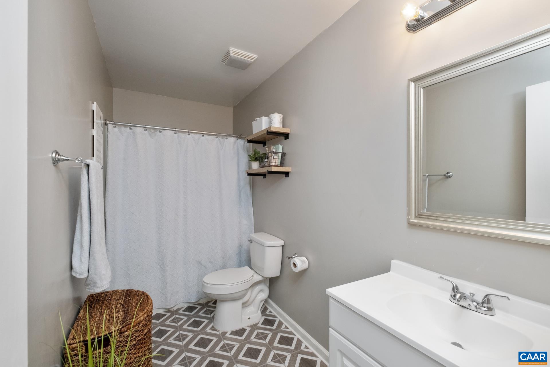 71 Azalea Road Ruckersville, VA 22968 - Photo 20 of 23 a bathroom with a sink toilet and shower