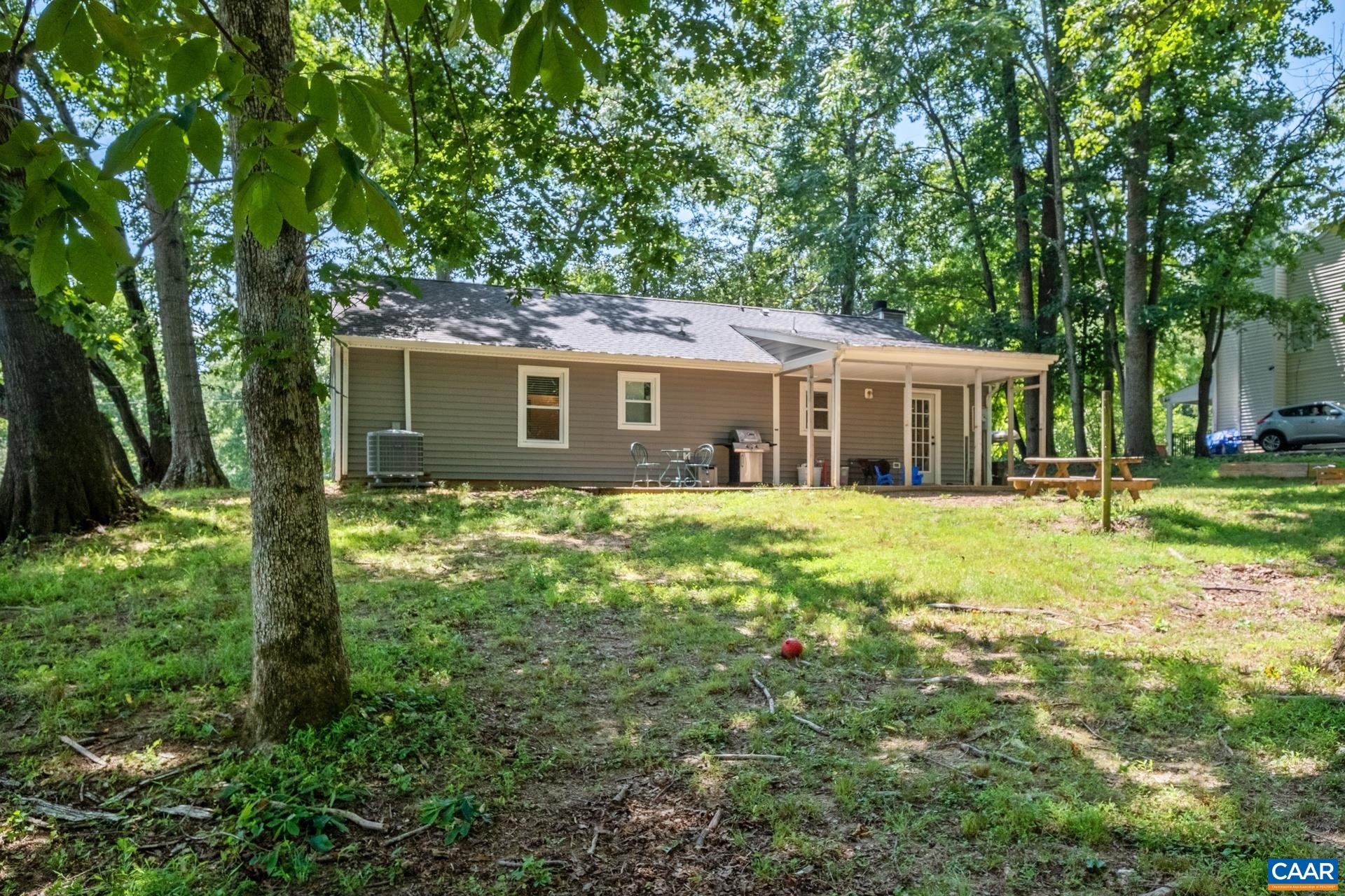 71 Azalea Road Ruckersville, VA 22968 - Photo 21 of 23 a house view with a garden space