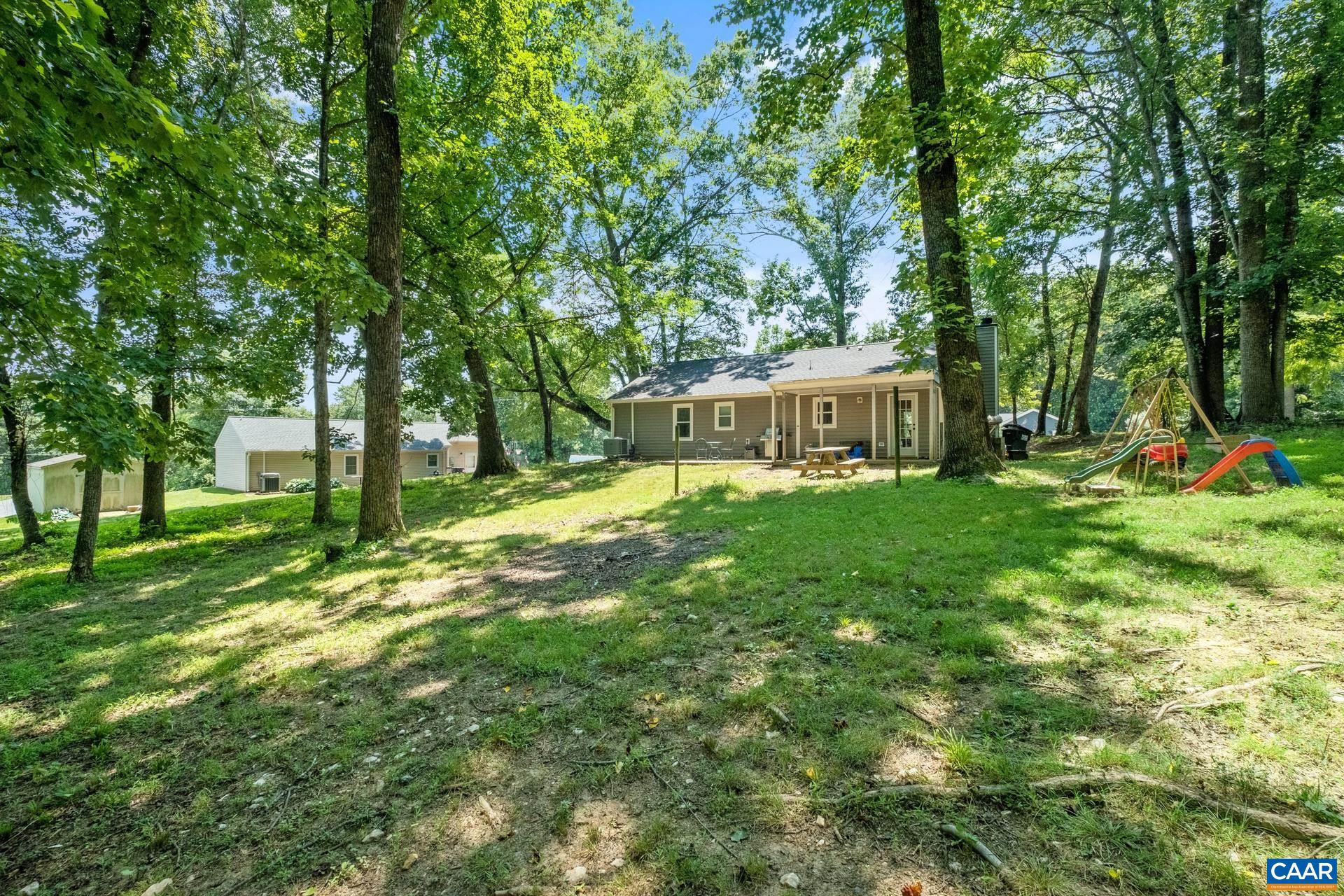 71 Azalea Road Ruckersville, VA 22968 - Photo 22 of 23 a view of a house with a big yard