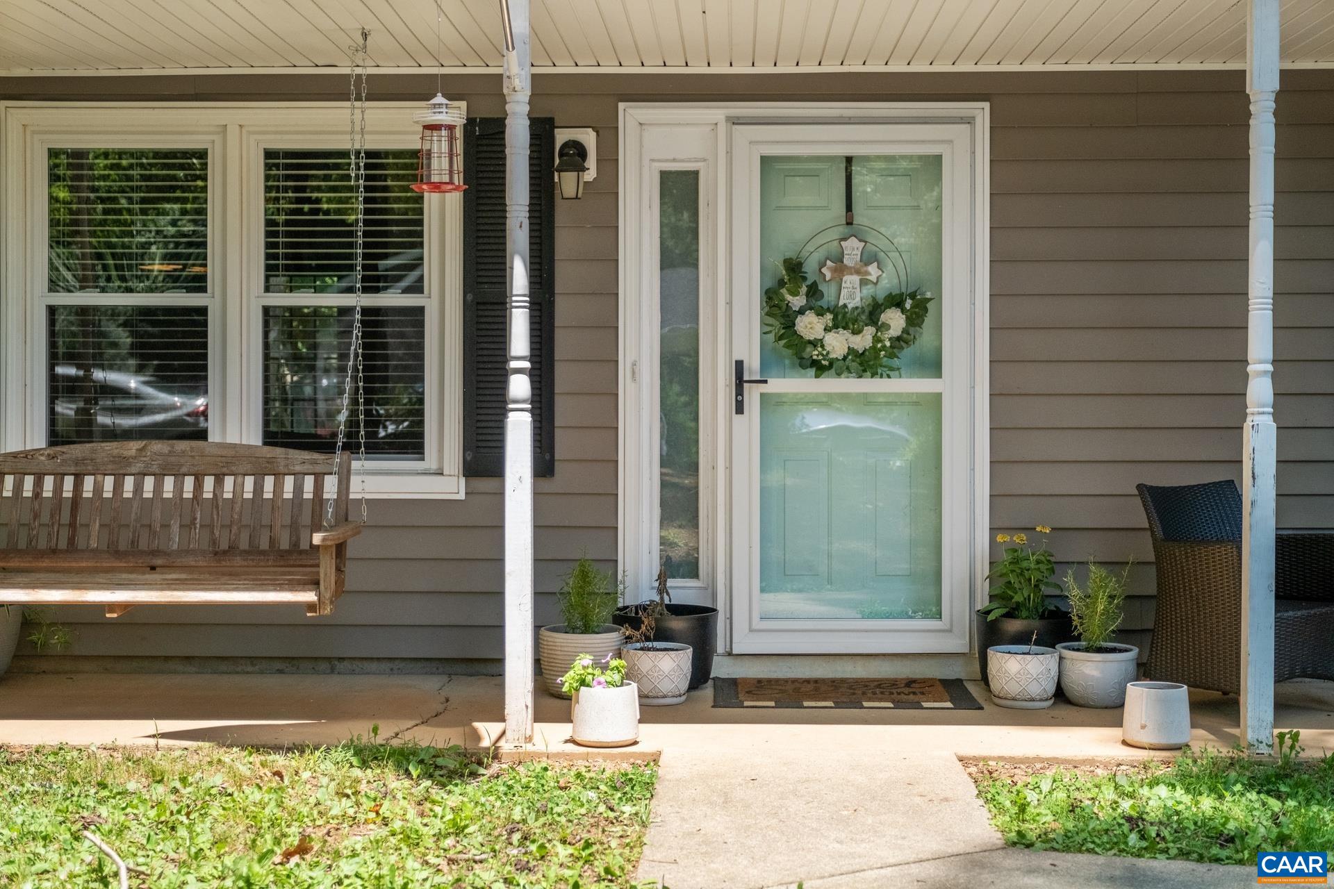 71 Azalea Road Ruckersville, VA 22968 - Photo 4 of 23 a front view of a house with a yard