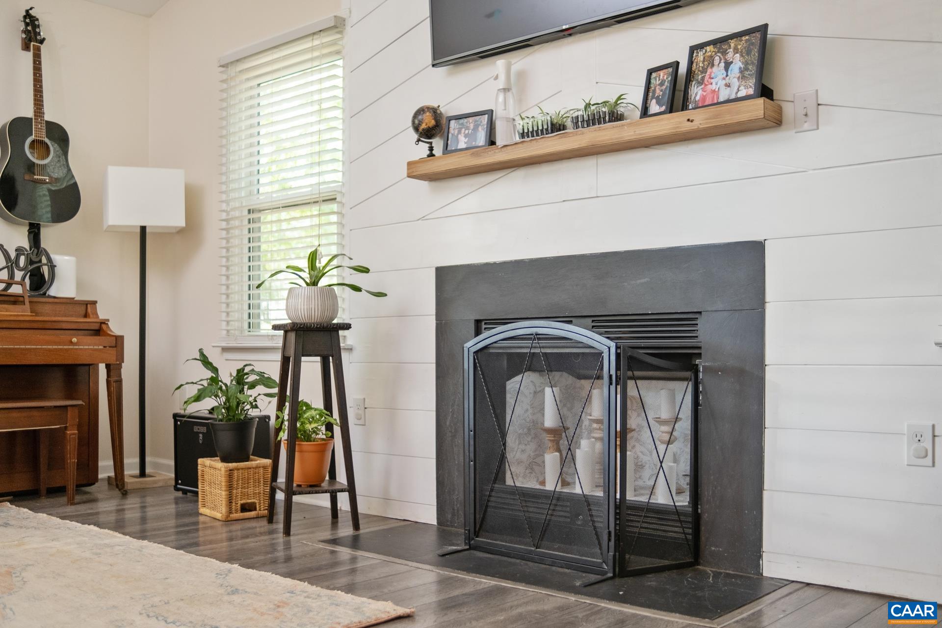 71 Azalea Road Ruckersville, VA 22968 - Photo 7 of 23 a living room with furniture and a fireplace