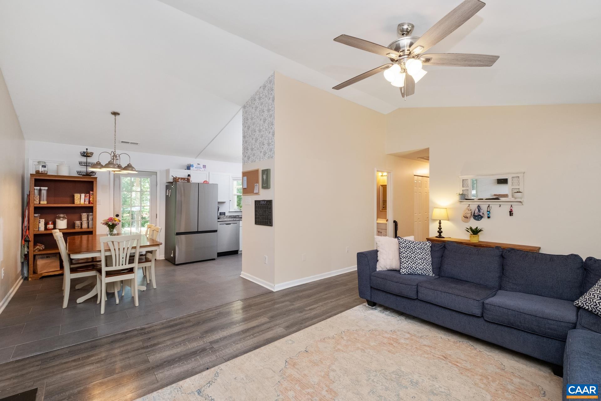 71 Azalea Road Ruckersville, VA 22968 - Photo 8 of 23 a living room with furniture and kitchen view