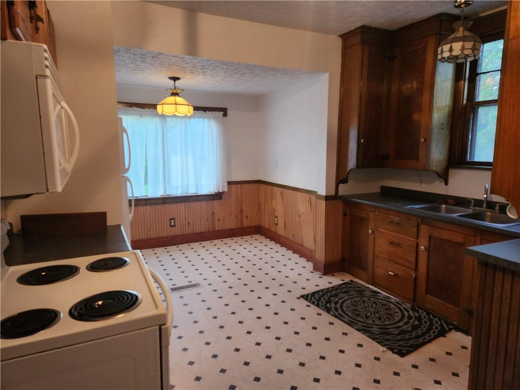 6 Hadley Road Greenville, PA 16125 - Photo 2 of 9 a bathroom with a sink a toilet and a mirror