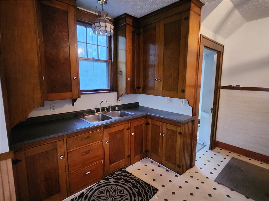 6 Hadley Road Greenville, PA 16125 - Photo 4 of 9 a kitchen with sink and cabinets