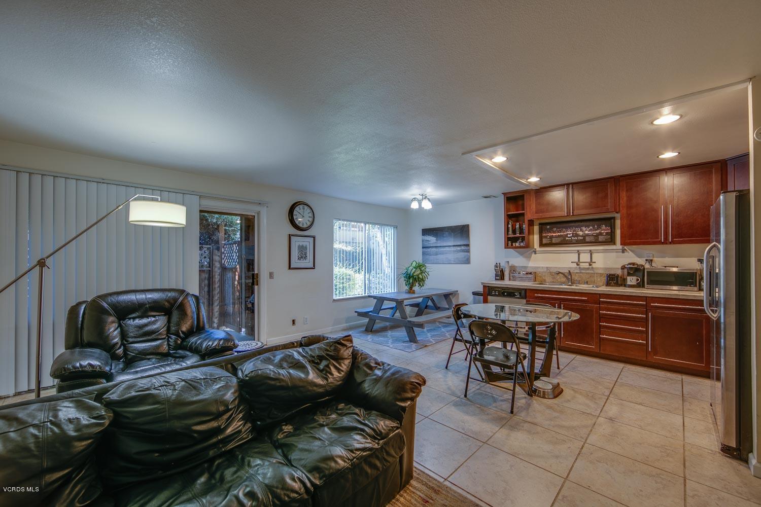 1772 Sinaloa Road, Unit 187 Simi Valley, CA 93065 - Photo 3 of 18 a living room with furniture and kitchen