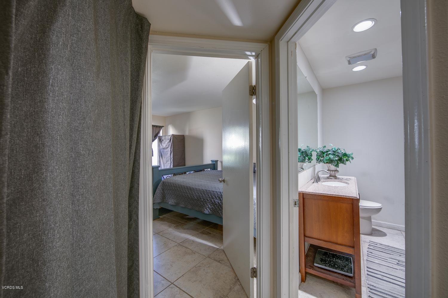 1772 Sinaloa Road, Unit 187 Simi Valley, CA 93065 - Photo 8 of 18 a view of a bedroom from a hallway