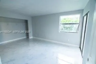 an empty room with a window