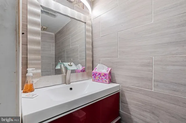 a bathroom with a sink and a shower