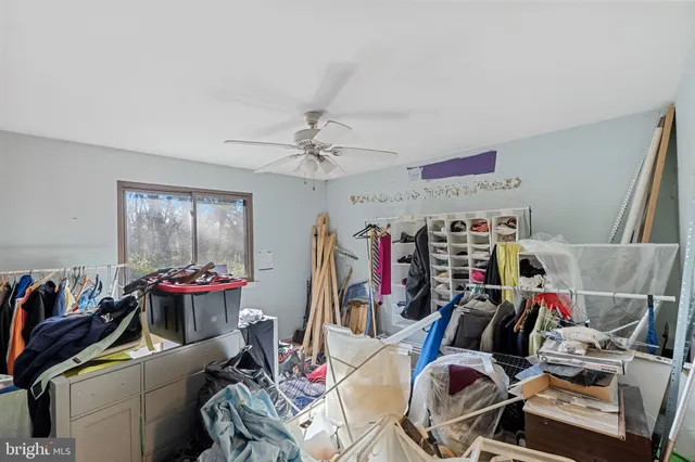 a view of a livingroom with furniture and toys