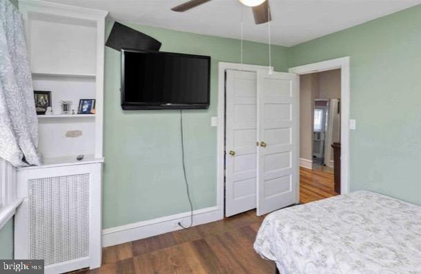914 Township Line Road Elkins Park, PA 19027 - Photo 21 of 22 a bedroom with a bed and a flat screen tv
