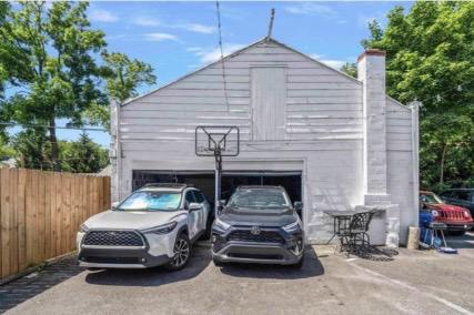 914 Township Line Road Elkins Park, PA 19027 - Photo 3 of 22 a car parked in front of a house