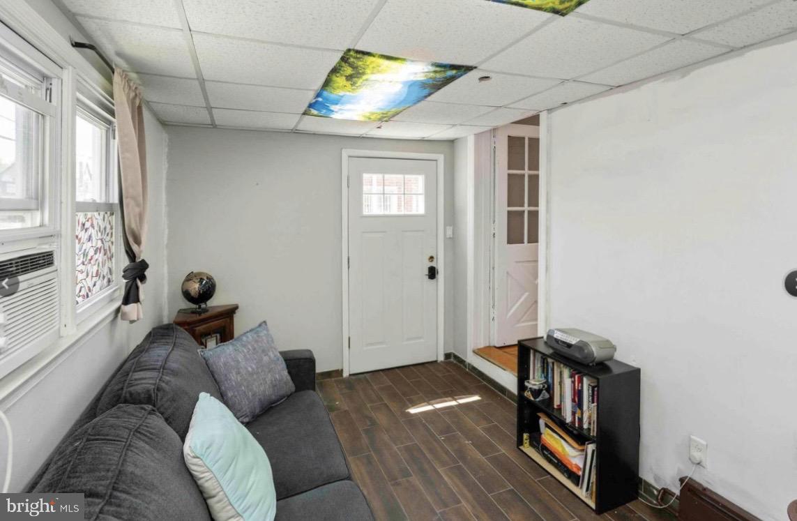 914 Township Line Road Elkins Park, PA 19027 - Photo 4 of 22 a living room with furniture and a window