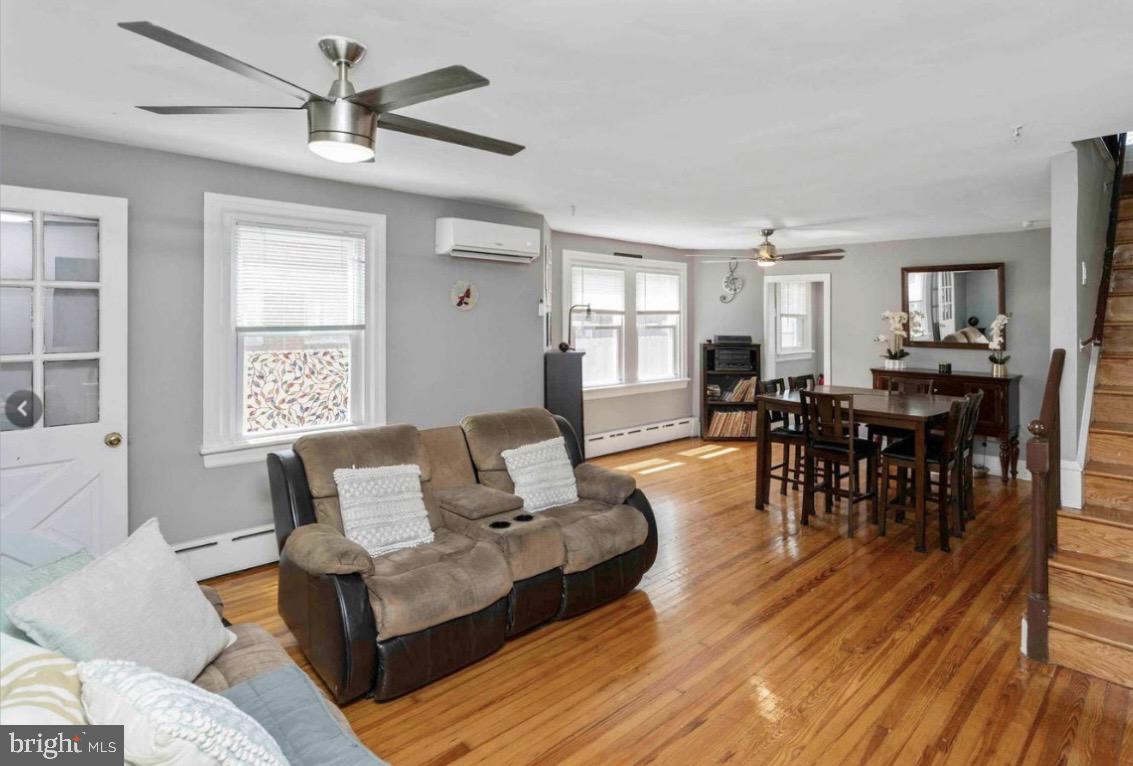 914 Township Line Road Elkins Park, PA 19027 - Photo 6 of 22 a living room with furniture and a wooden floor