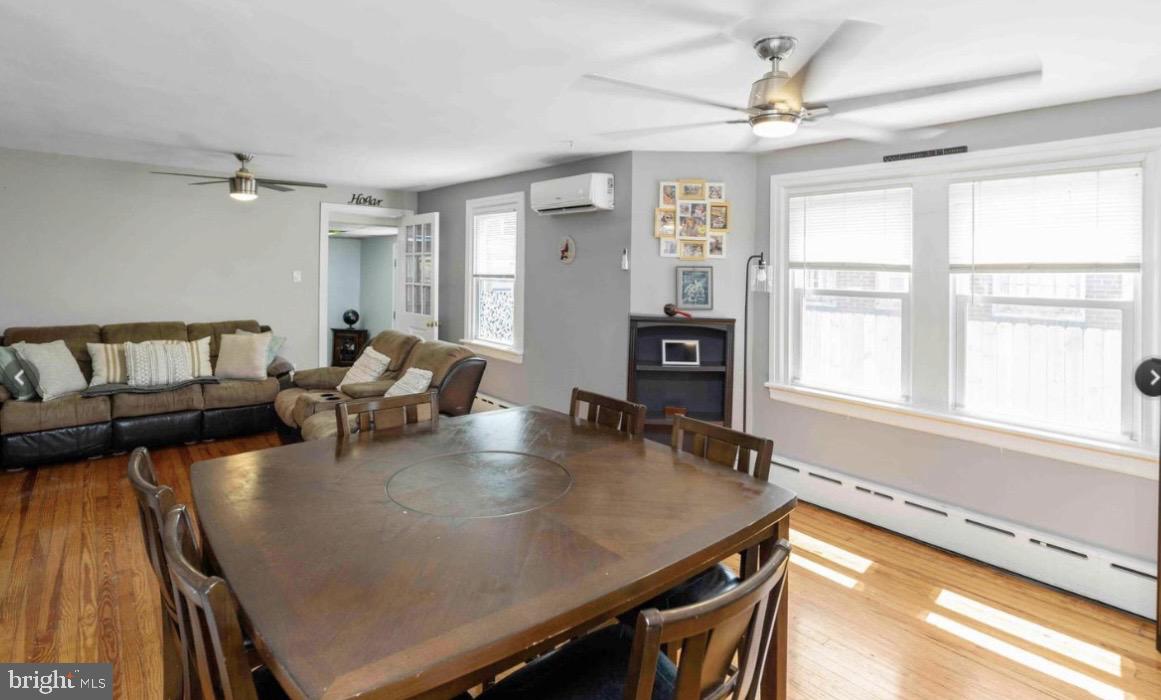 914 Township Line Road Elkins Park, PA 19027 - Photo 7 of 22 a living room with furniture and a large window