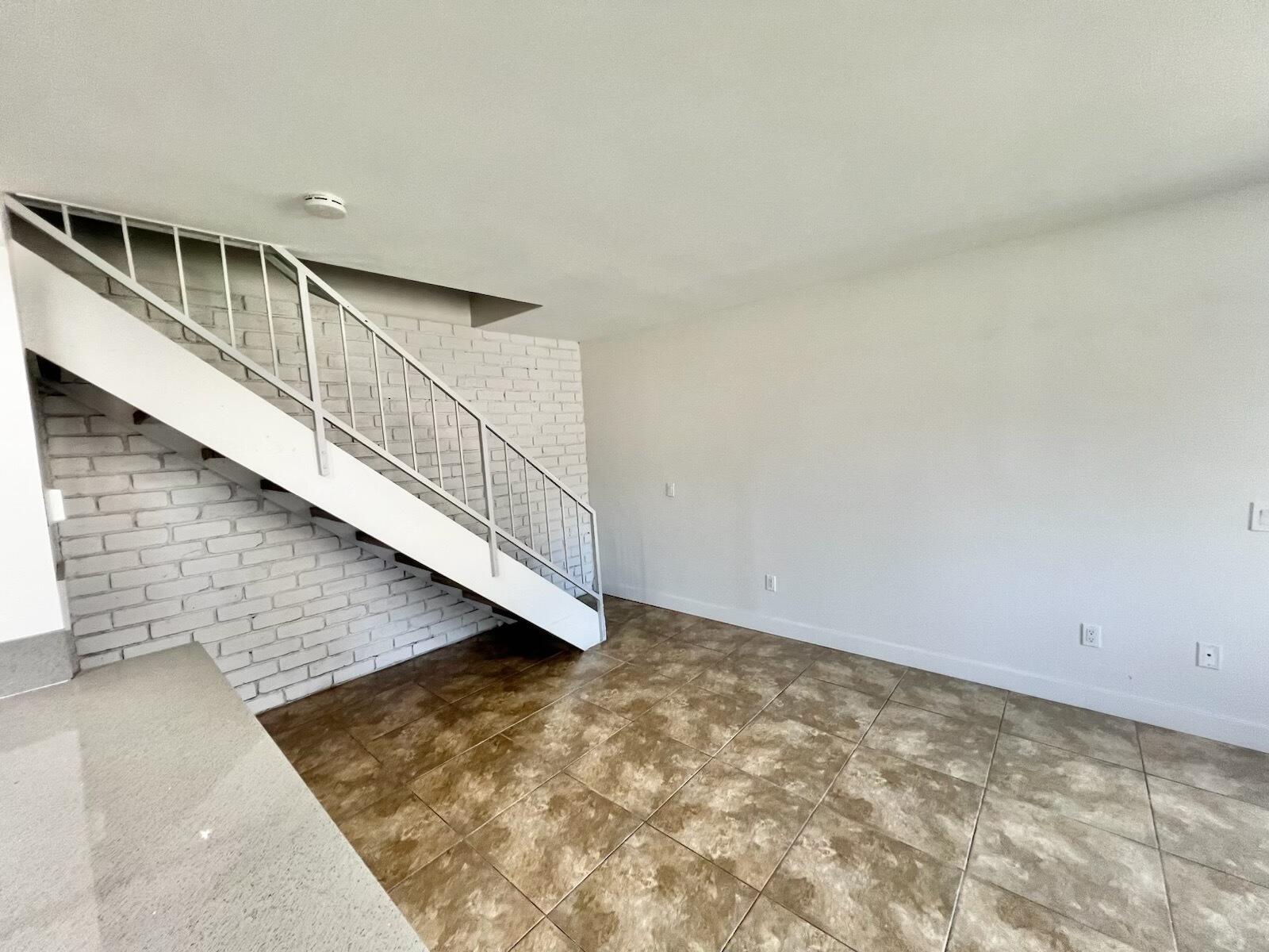 72671 Eagle Road, Unit 3 Palm Desert, CA 92260 - Photo 15 of 25 a view of entryway with wooden floor