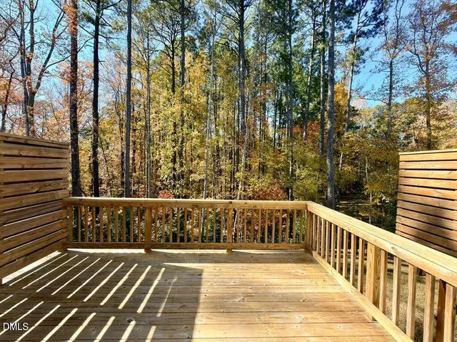 a view of balcony and wooden floor