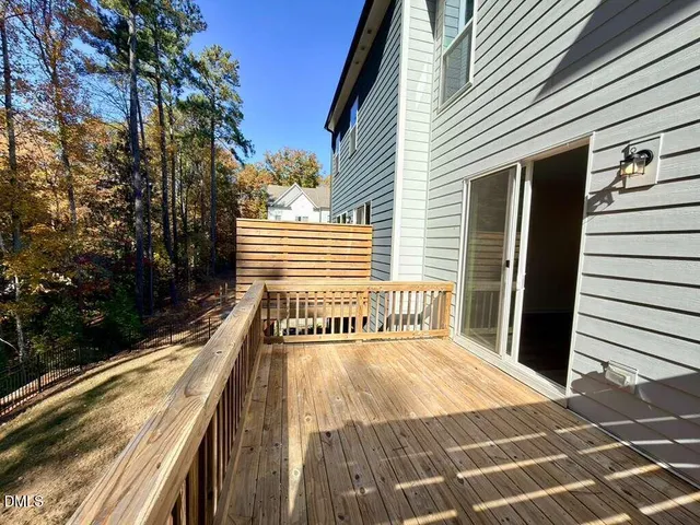 a bathroom with a sink and a glass door shower