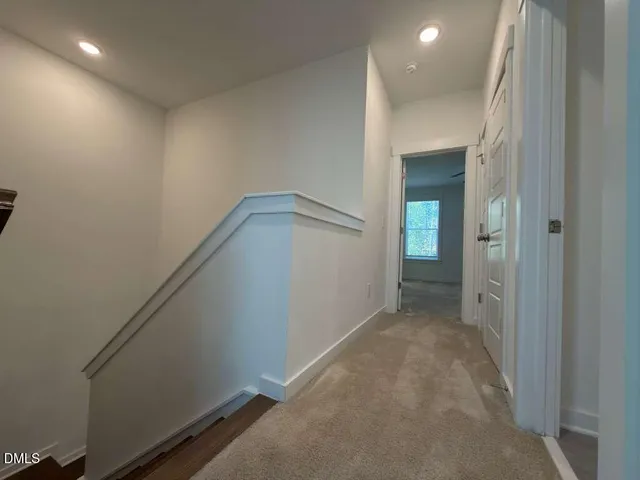 a bathroom with a double vanity sink and mirror
