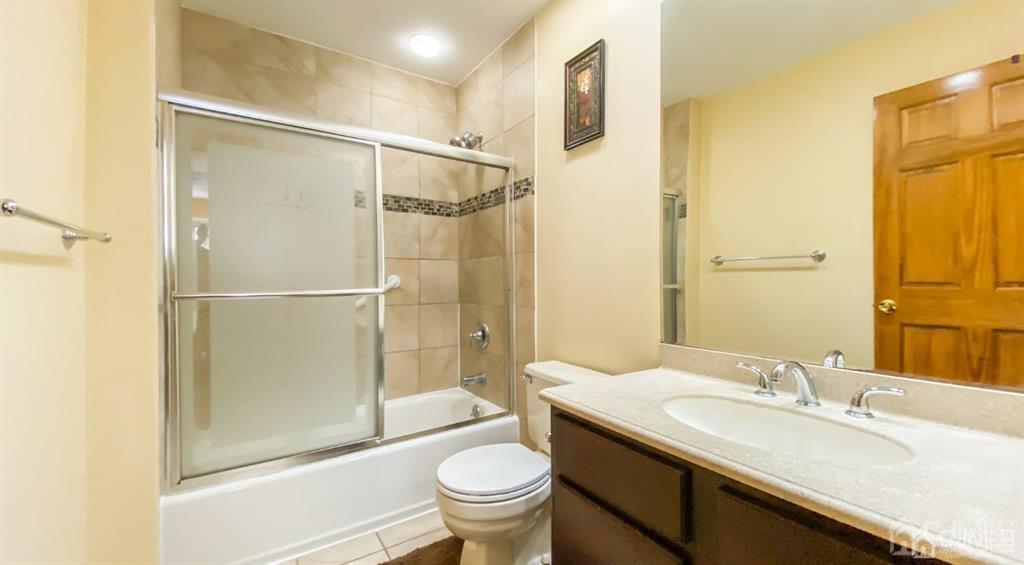 0 Lavender Drive Edison, NJ 08820 - Photo 25 of 36 a bathroom with a granite countertop sink toilet and shower