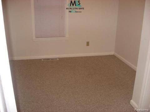 951 Capac Road Allenton, MI 48002 - Photo 5 of 5 915 Capac Bedroom 2