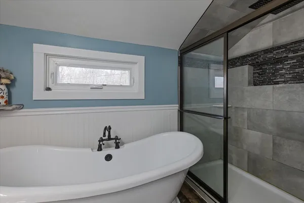 a bathroom with a sink and mirror