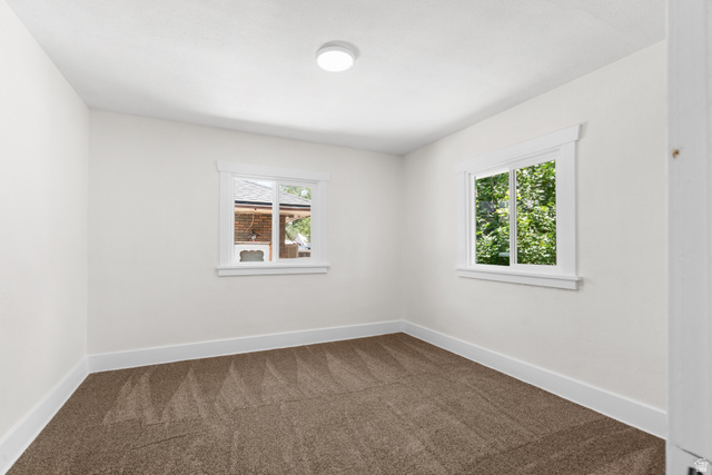 2862 Fowler Avenue Ogden, UT 84403 - Photo 13 of 23 Neutral wall finishes with white baseboards and window trim